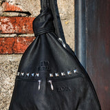 Biker Leather Backpack with Pyramid Studs – Bold Style for the Rock Enthusiast - Radka Sillerova Atelier